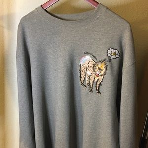 Acne Studios embroidered appliqué sweater.